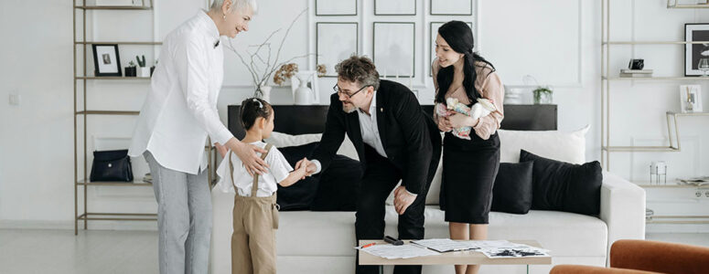 Social worker introducing a child to their foster family.