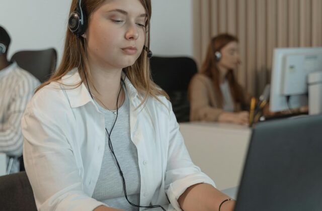 Freelance transcriber working on her laptop.