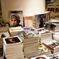 stacks of all types of magazines and publications in a room