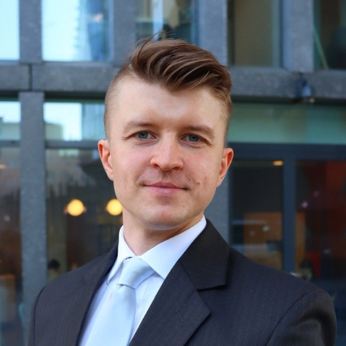 Rafal Reyzer's headshot.