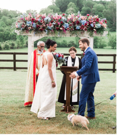 Tara Reck officiating a wedding at an outdoor ceremony
