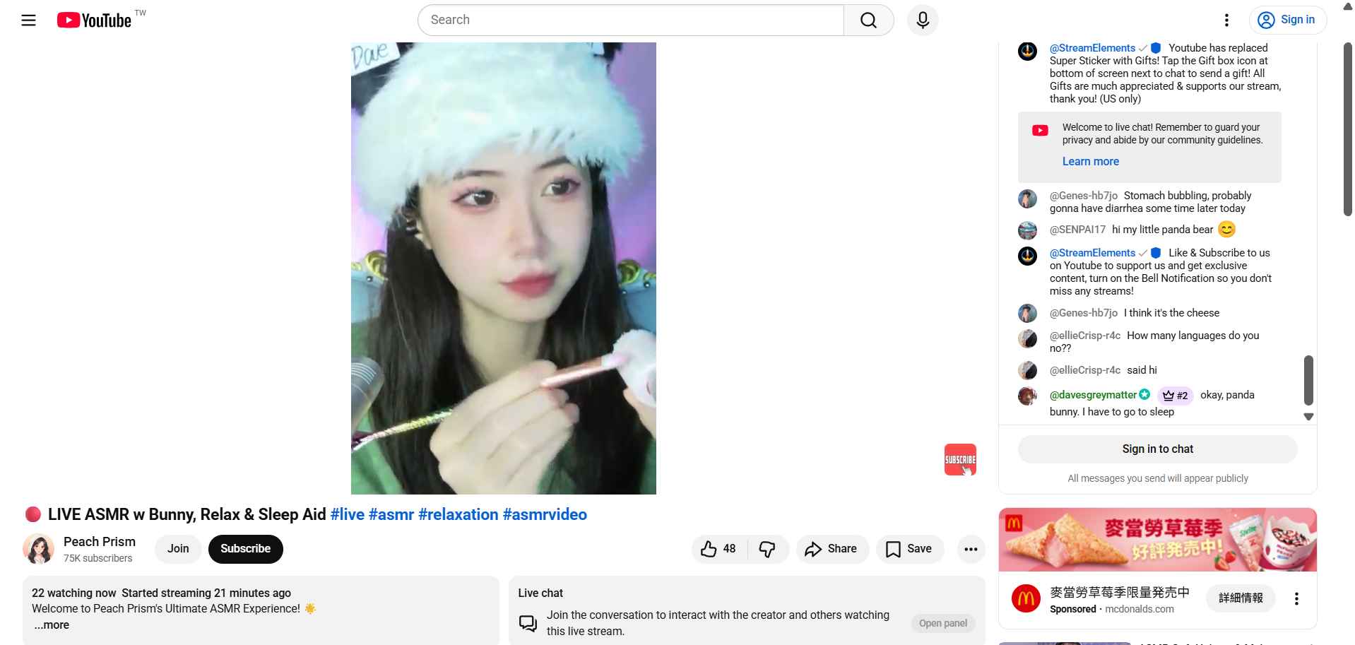 Screenshot of an ASMR sleep stream with the streamer running a brush over the microphone.