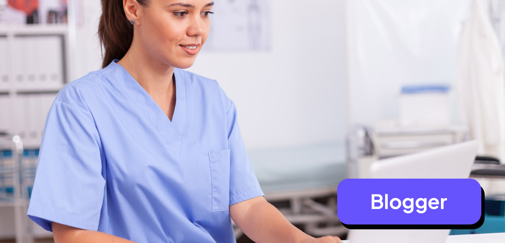 Nurse typing on a laptop and writing a blog between shifts