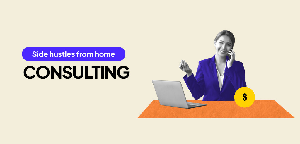 Freelance consultant sitting at her laptop and talking on the phone with a client
