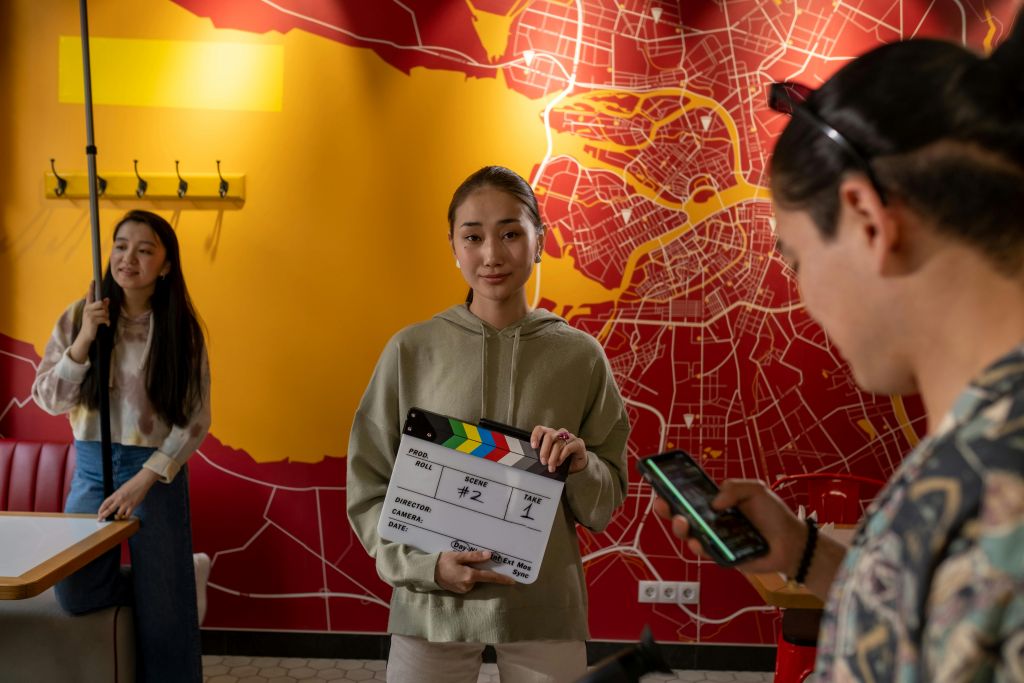 Corporate influencers at work filming a skit.