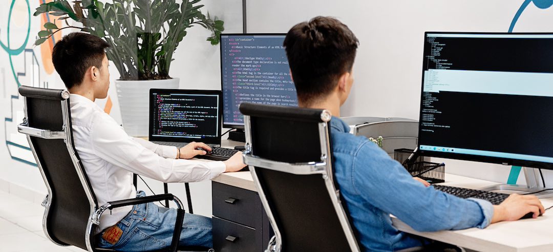 Two engineers writing code with Claude Code.