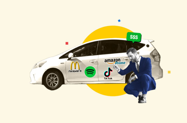 Man sitting in front of his car with lots of advertisements that he was paid to put on it