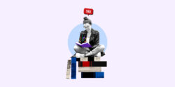 Freelance worker sitting and looking at an open book that she's getting paid to read