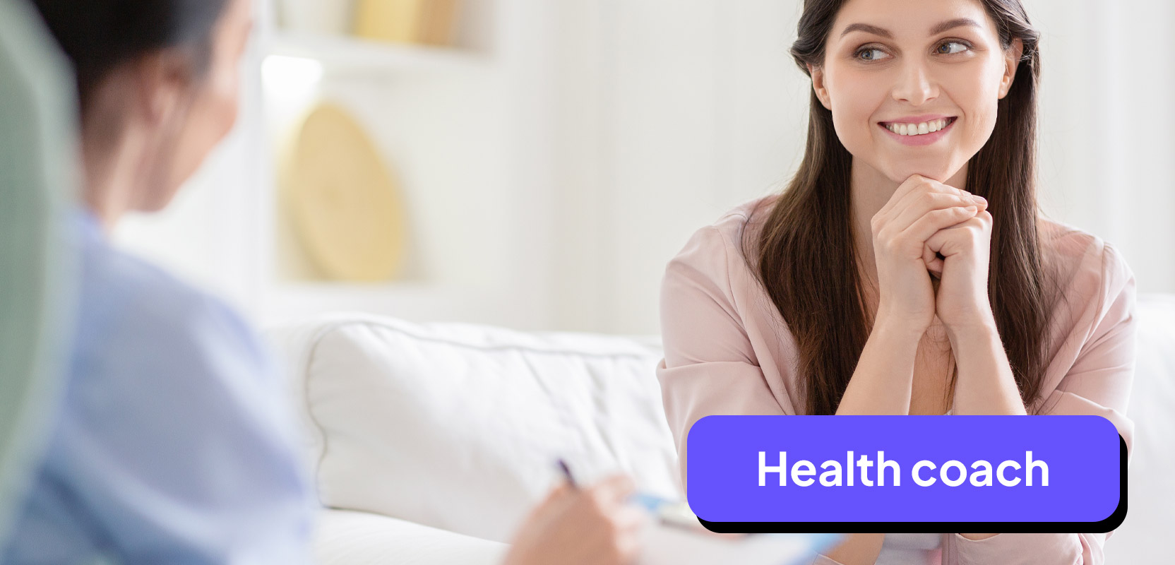 Nurse chatting with a patient as a part-time health coach