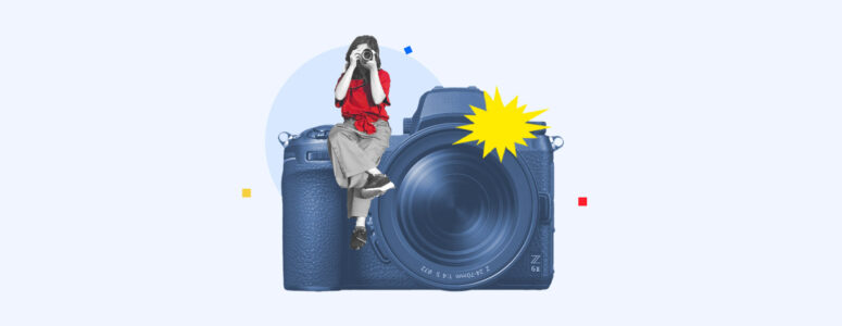 Photographer sitting on top of a camera and taking a picture
