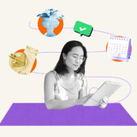 Woman looking at a tablet and doing work for her event planning side hustle