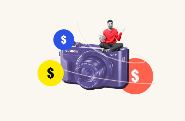 New photographer sitting on oversized camera decorated with money signs