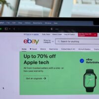 Laptop screen showing the eBay home page.