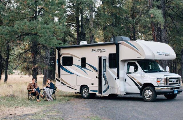 Recreational vehicle and two guests at an independently run RV park