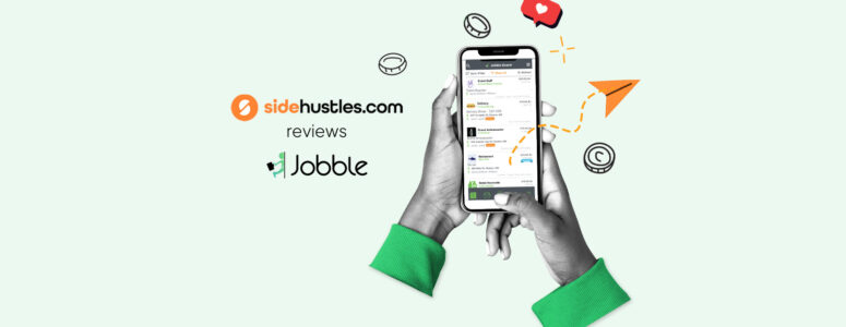 Two hands holding a smartphone displaying available jobs in the Jobble app