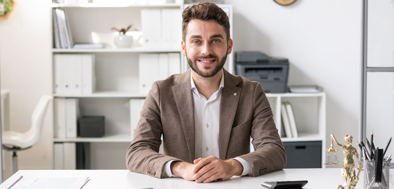 Lawyer sitting at a desk preparing to give a tutoring session