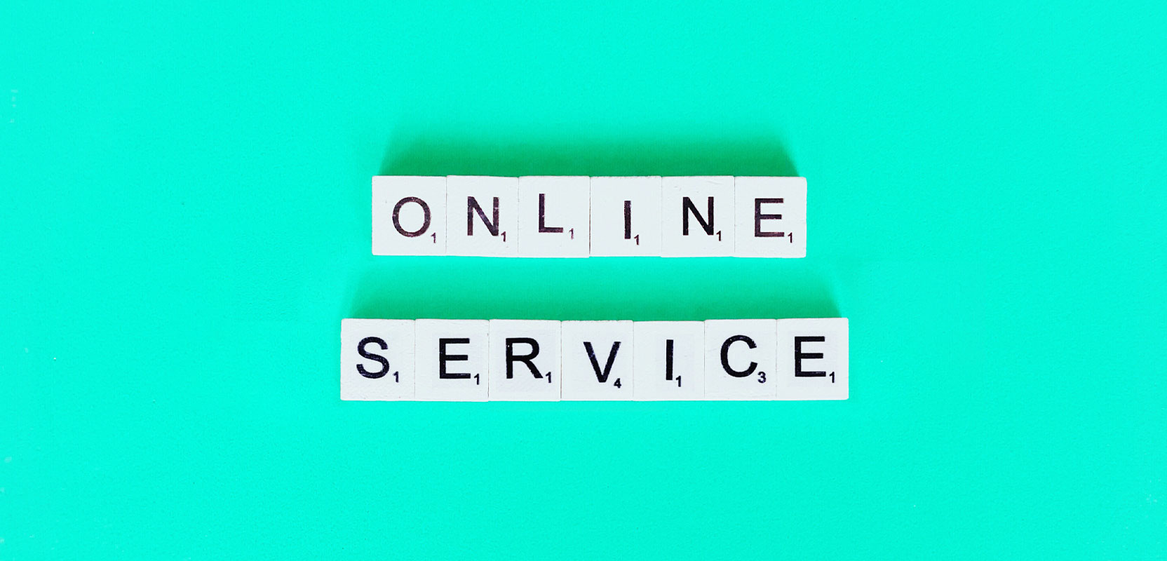 Scrabble chips spelling out the words Online Service