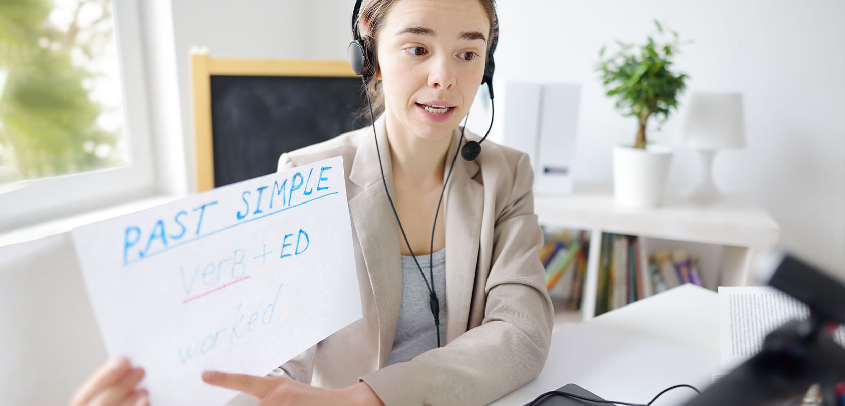 Part-time tutor giving an English lesson