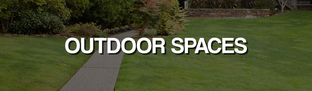 "Outdoor spaces" against a darkened background showing a garden path