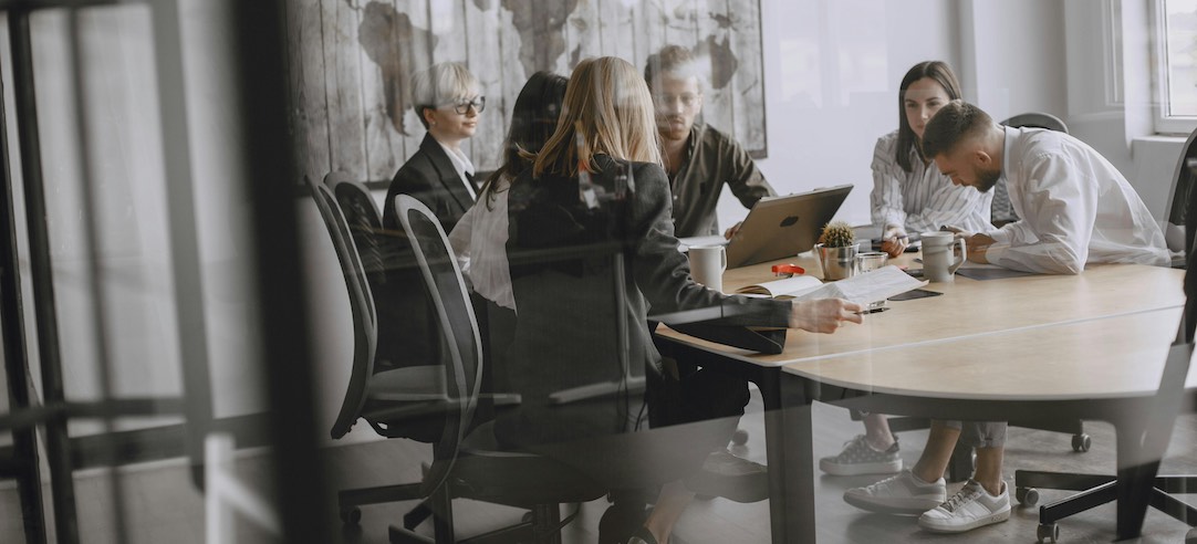 Group of employees in a work meeting.