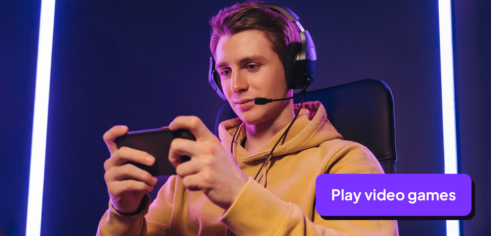 Teenage boy playing video games on his smartphone as part of his side hustle