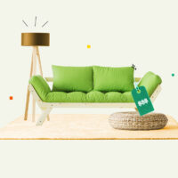 Couch with a price tag on it waiting to be sold as part of a furniture-selling side hustle.