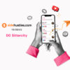 Two hands holding a smartphone displaying available jobs in the Sittercity app
