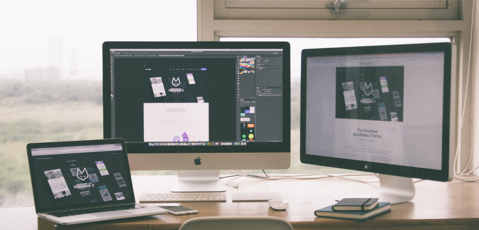 Several computer monitors showing a blog