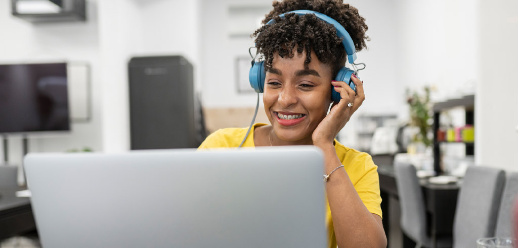Freelance transcriptionist sitting at a laptop