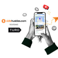 Two hands holding a smartphone displaying the interface of the Turo app