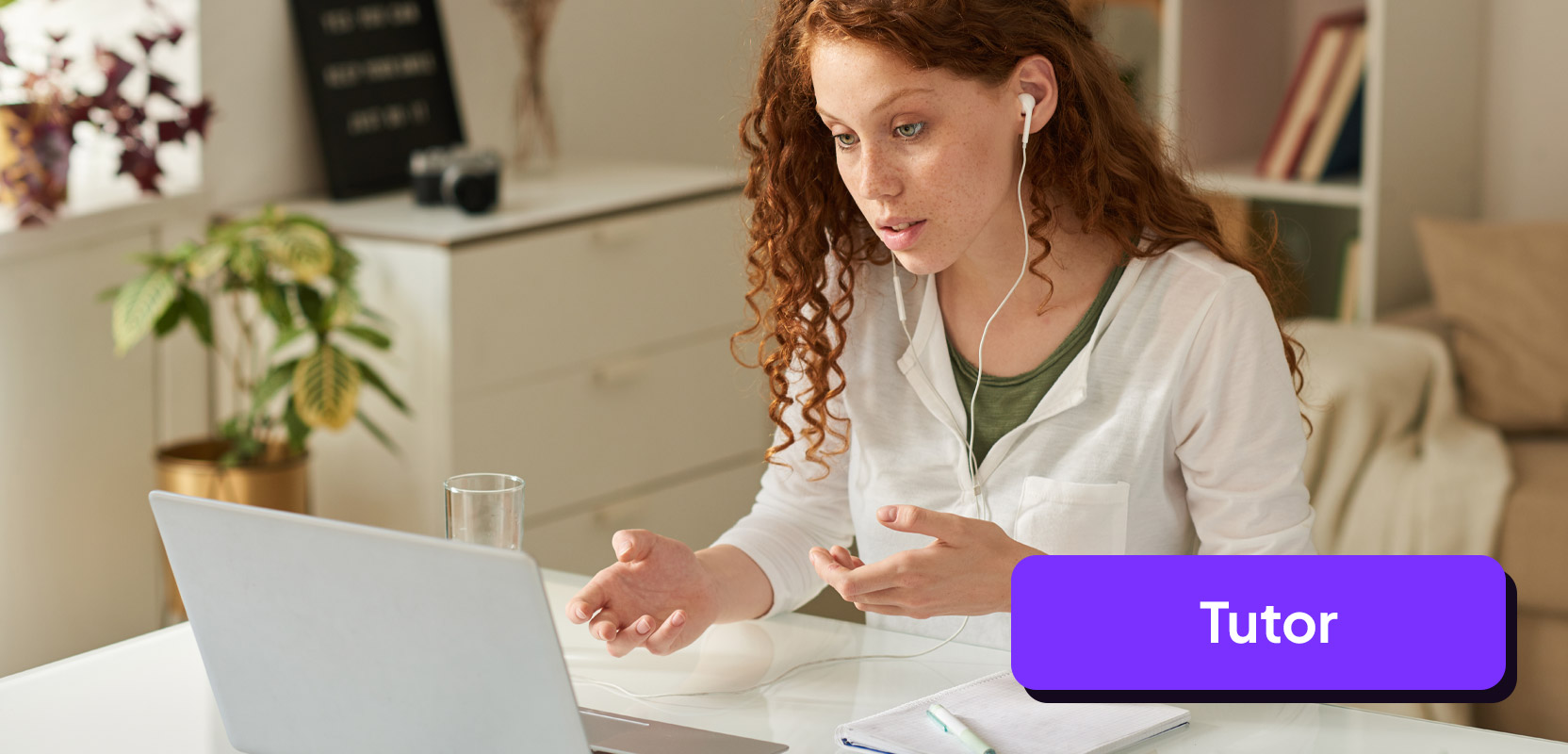 Teenager sitting in front of laptop giving a tutoring session as part of her side hustle