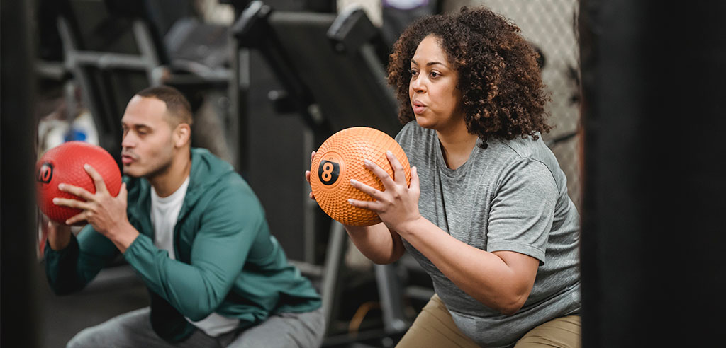 a weigh loss coach is teaching his client