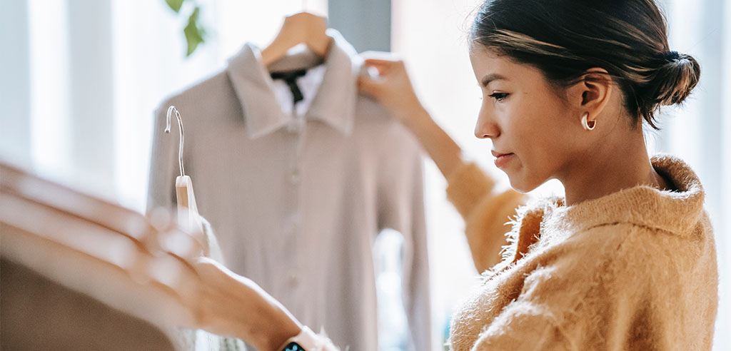 a personal shopper is picking clothes