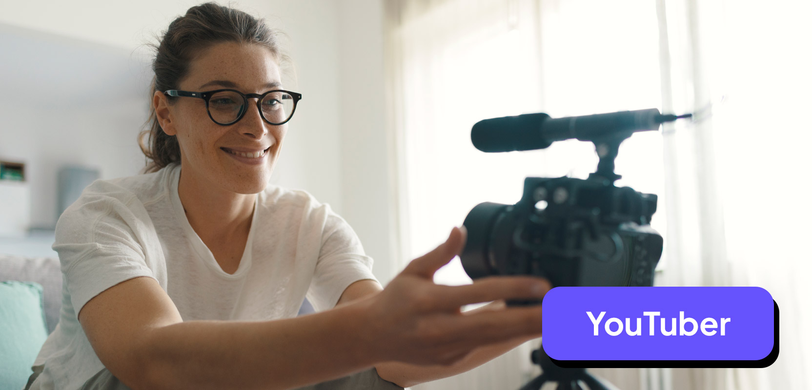 Nurse and YouTuber positioning a camera in preparation for shooting a video